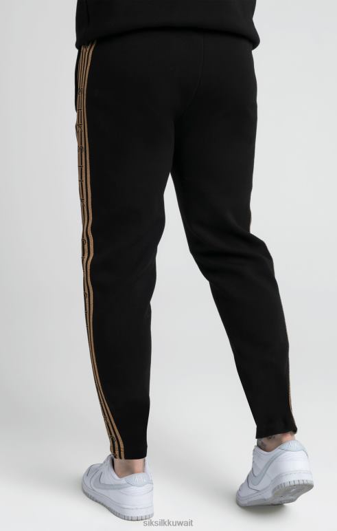 SikSilk بنطال رياضي بشريط محبوك باللون الأسود والذهبي رجال JL4FJ508 ثياب  [JL4FJ508] : ملابس رياضية للأداء من SikSilk Kuwait, أطلق العنان لإمكانياتك  مع SikSilk jersey shorts.
